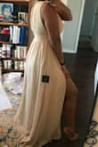 Okay - runs a little large, probably could have gone down a size to a M... but nothing some boob tape and hemming can't fix :) - Ashley D.