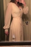 I bought this dress for my engagement photos at the beach and I'm so excited to see it blow in the wind! It's go GREAT length for us tall girls! Touches the ground with some extra fabric! Not a see through material, but I plan to wear nude underwear. Also because it's a wrap dress you can tie it a bit tighter to not show as much cleavage depending on your bust size! Also at least for me it's makes me look suuuuuper slim because of the way the dress is fitted. In the pics I'm wearing a sports bra with no padding. - Lauren T.