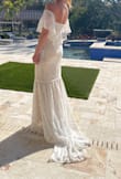 Beautiful- fits like a glove and comfortable! Not like any other bridal gown. - Tonya H.