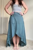 I was on the waitlist a month ago for this skirt. Even though I wouldn't have it in time for what I wanted it for I still ordered it. It arrived today and I love it! Compared to my chest and waist, my thighs and butt are much bigger so the large works great for me. However, that means it is a couple inches too long in flats but would be perfect with heels. Also wearing the "Brami ribbed V-neck" tank in this pic! Great combo! The skirt and this tank meet perfectly in the middle. - Catherine Q.