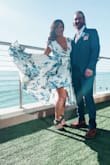 The dress was perfect. Was nice and snug in all the right places and not too tight where it shouldn't be. The material is so light and flowy, I wore it outside in the Florida heat and survived. No material sticking or excess sweating here. - Casey L.