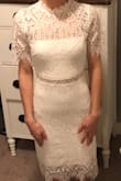 I love the way this dress fits, it's just tight enough without being uncomfortable. It also has very unique details, and it feels soft unlike some lace that can be scratchy. Can't wait to wear it for my wedding rehearsal! - Maddie N.