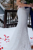 I had a Town Hall wedding and it was the perfect dress. I'm 5'2", it didn't need alterations at all. Was a great and comfortable fit, very flexible light boning in the front and a slight flair at the bottom. A nice sash really dolls it up. The dress looks like a $300 dress (based on brick-and-mortar store shopping attempts). Could not be more happy with the details and the fit. - Kathleen B.