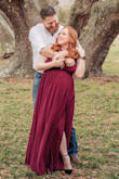I got this dress for my engagement pictures and it was AMAZING! Even better than I expected. Looked so great on and photographs beautifully. I did have to alter it, but expected that since I'm very short. Had the bottom of the dress hemmed (even though I was in heels - it's a very long dress), the shoulder part shortened, and had them add some coverage in the chest because it was a little more open than what I'm used to. Loved it!! Would buy one in every color! - Ashlyn M.