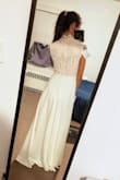 I bought this dress for civil ceremony in May. XXS is a perfect fit for petitte size like me. Great quality and great value. It still needs length alteration as I am short. - Caren L.
