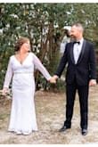It was so beautiful and I got a lot of compliments on the dress! I'm short so I knew I'd have to get it hemmed, it's 3 layers so it made it a bit more expensive, but it was worth it! Plus those layers came in handy for the arctic weather that descended on Dallas for my wedding! I also had to have the sleeves taken up a bit. I added the belt. The dress has a slight stretch to it so its easy to move around in, and it's comfortable! I highly recommend! - Jill C.