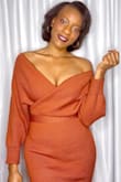 The bottom portion of the dress is definitely hip-hugging but if it is the look you want then that's not a problem. The top portion of the dress can be worn to fit on the shoulders or worn off the shoulders. I received SO many compliments and it was definitely worth the purchase! - Ayona R.