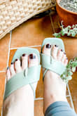 Can't wait til it's warm enough here to wear these pretties out. Wore them around the house for a couple of days. Very comfy out of the box. Heel is low so no toe pressure but still makes your legs look great. A little lighter of a green in person. True to size. No rubbing or break-in time. Perfect color for Spring! - Thea C.