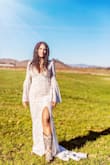 The moment I saw this dress I fell in love with it and I just knew it was the one!! I felt like a bohemian goddess in this dress!! Those sleeves and that front slit.....OMG!!! I went with cowgirl boots and it was absolutely perfect!!! I received numerous compliments too!! My now husband LOVED the dress so much!! It was perfect for our hot air balloon wedding!!! I HIGHLY, HIGHLY recommend this dress!! You will not be disappointed!!! Thank you Lulus!!! :)))) - Pamela G.