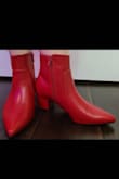 These boots are super cute and comfortable! Due to the material, they do crease but it's unavoidable. The heel is on the shorter side so they're very comfortable to wear all day. I love these boots! Highly recommend - Caroline M.