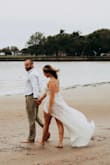 This was actually my "back up" dress for engagement photos that turned out to be the star of the show. I have an athletic build and this dress fit me like a GLOVE right out of the bag. Like I've never had a dress fit so nicely. The photos speak for themselves and I am so happy with my purchase. If I end up hating the other wedding dresses I try on, I may end up getting married in this! 

Just fair warning it is sheer, I have tattoos on my hip that you can ever so slightly see through the lace. - Meghan R.
