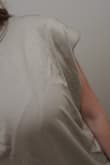 This might be my first negative review for Lulus. They definitely get you with the final sale on this item. It fits EXTREMELY large. I normally wear a Medium/Large and the Medium fits like an XXL on me. Also, the shoulder pads are small and only go halfway up the sleeve, so it's your normal shoulder and then the shoulder pad flops down over your arm and just looks really droopy, not boxy like the picture. Such a bummer, because I was pumped about this top and chose to order it off here instead of Vici, because it was $10 cheaper, but now I see why the price was lower. - Haley B.
