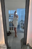 This dress is so simple and chic. I am using it for my rehearsal dinner and bachelorette party with heels (also from Lulus) and I'm so excited! 
I got an XS, and it fit nicely, but it's not flexible. It's a little see through too, so I need to wear spandex underneath. - Jasmin L.