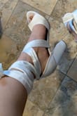 I purchased them for my wedding (I got the white) I am obsessed, and they are comfortable. Definitely getting them in black next time. I am a size 7 in shoes, they are true to size. They are a thick heel so easy to walk in. - Maria J.