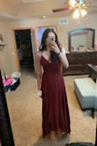I love this dress. Great quality and fits true to size. The back is somewhat complicated  with the strings, still love it though. - Megan B.