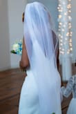 I love love my dress. It was love at first sight. First I order a Large. To me it was way too big. I changed it for a medium then the medium was too tight. So last minute I had to change it back to a large and just have my tailor to fix it. My dress was perfect. At my wedding everyone was shock to see how beautiful and amazing I looked. - Janice J.
