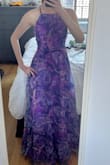 I really wanted to love this dress, but the skirt is just too much for me, even at 5'8 in 3" heels. I'm rather lanky with subtle curves, and normally extra fabric works well on me. But this fabric is a little stiff, and the skirt stands out, making my hips and thighs look much larger than they are. The top and open back are beautiful and so flattering, even for my smaller chest. But I just can't love it. - Lauren I.
