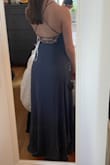 I love an open back dress, but normally the open back cuts at the small of my back, emphasizing my waist. This one cuts a little higher, making my waist more truncated. The wrap bust was a little too revealing for me, and the open slit would be hard to dance in, so I had to send this one back. - Lauren I.
