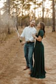 I wore this for my engagement photos and I love it so much!! I originally ordered a medium and had to exchange it for a small, even then it was still a little loose on my waist but not too bad. It is very long, even with heels, but it makes for perfect flowy pictures! Amazing quality and gorgeous color, would 100% recommend! - Douglas E.