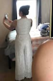 This jumpsuit will be perfect for my casual bridal shower. It's very high-quality because of the double layer of lace with beige under it. It's not see-through at all. The fit is perfect. Usually I have to size up because I have very wide shoulders, but for me a medium ended up working fine. The only thing I would caution is that if you have a very long torso it might give you a slight wedgy. I have a very short torso and the inseam part seems to run up a little high. Other than that I feel gorgeous and I look gorgeous!! - Brieanna J.