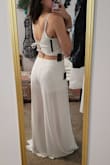 I love this little duo. I bought it to wear for upcoming wedding festivities. I ordered a size large because I always size up for my booty. I'm having the bottoms altered because they are very long and I'm wearing them with platform sandals and I'm not very tall and hate dragging pant legs. But they are well made and so comfy. - Lacy W.