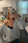 This sweater is definitely off the shoulder and sexy. I recommend wearing something underneath. I tried wearing it while running errands and I probably won't do that again. It's more of a sweater for dinner dates and such. - Alexandra B.