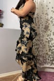 This dress is adorable and hugs your curves nicely. It has a little stretch to it so that helped me get it past my hips and bum. A little snug it the back side but not uncomfortable. I can't wait to wear this to a wedding in a few weeks. - Kristy T.