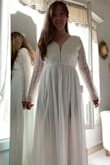 Do not hesitate to buy it. I had a hard time finding my dress, I had only 14 days before the wedding and this dress came out of the blue. I loved it since I opened it, it is not expensive and it is beautiful. Keep in mind that if you order it from Europe you have to pay an additional tax, but that's it. I got it in 5 days paying the fastest shipping, the shipping system was too good, from the USA to France in 5 days? I loved it. Thank you so much, everyone congratulated me that day for the beautiful dress. It was a little big and I had to make it smaller but I would not change the size because I felt very comfortable in it. - Maria F.