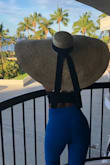 I bought this hat for my trip to Hawaii. It was too big to fit in a carry on but there was enough room on the plane that I was able to place it in an empty seat. Because of the strong winds I didn't get to wear it much but I felt fabulous when I did! SO MANY COMPLIMENTS! All eyes will be on you. The hat is good quality and my new vacation hat. - Alexis B.