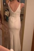 I love the fit and style of this dress! It's so simple yet super classy. I was debating between a small and an extra small, got the small and it fits great! It is also super comfortable and has a perfect amount of stretch while still being form fitting and super flattering. I can't wait to wear it at my reception! - Caitlin S.