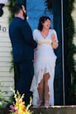 I definitely needed smoothing/shape wear under this dress- you can see every line for sure, and I needed the hips taken in a little. I got the xl, I am a 12/14, large/lx. But it looked just right in pictures! I'm waiting for the professional ones to come back in- but it makes a sweet little wedding dress - Ashley H.