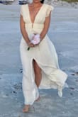 This dress was EXACTLY what I pictured wearing on our trip to the beach for a vow renewal, and I didn't even need to iron it! I didn't wear a bra, the material is so soft, I felt like I was in a nightgown. Highly recommended - Kim B.