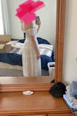 I'm sad about this dress, was really excited about it. But unfortunately it doesn't stay up. I usually order a medium or large, so I sized down based on reviews. It zips well, but when you move it slides down exposing your bra. It may be because I have a small chest? I wish this worked. - Kelsey D.