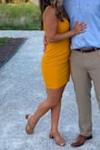 I LOVE this dress. I ordered it for a wedding and I'm obsessed. The color is fabulous. The material is a little stretchy so it does not feel restrictive. 10/10 would buy it again. I ordered a small. - Kylee S.