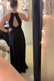 Seriously, I'm IN LOVE with this dress. I was a little worried because I wore a small two summers ago, gained a lot of weight, then lost most of it, and I wasn't sure what size would fit me. I was borderline afraid the medium would be too small, but it fits perfect! I also was concerned about my bust, but it's just the perfect amount of cleavage. This dress is sexy and classy all in the right ways. I felt like a supermodel trying it on. It's great quality, and is so flattering. I was afraid it would show my areas I am not in love with, but it's so dang flattering. Get this dress. You will not regret it. - Kayla J.
