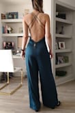 I love how this looks; I have a long torso, which makes it hard to get outfits like these to fit without being too tight in the front area. This one having such a long inseam is so forgiving for people like me. Also I love the width of the legs bc it makes it a bit more dressed down given how revealing the top is. The length is just right for me, 3 inch heels is all I need to get it off the floor. Can't wait to find a chance to wear it! - Alma R.