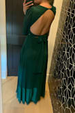 I ordered this dress for an upcoming wedding and I absolutely LOVE it! I ordered a medium and it fits me perfectly. The waistline is sliming and is very flattering for a "pear" shape such as myself. A few things to note: 
1) I am 5'11" and the dress touches the floor. With 3in heels, the dress is the perfect length. For anyone shorter I would anticipate needing to hem the dress. The sleeves are also long.
2) I am guessing that the top would be very tight if you have larger than a B cup bust. It fit me snugly. - Emma G.