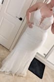 This dress is really pretty but itchy. I really liked the top. The glitter was everywhere! It fit great but ultimately not for me. I really really wish it had more if a train. I ordered a size 4 and it fit really well. - Danielle W.