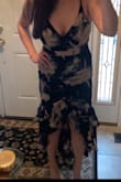 I'm typically a medium with Lulus dresses but this one barely zipped. If you're a bit busty like me, but small shoulders, def can't fit a bra in here. The shape of this dress gave me an hourglass that I don't have but that was at the sacrifice of breathing deeply. Ruffles fanned out a bit much and the length was too short.  Large may have been a different ball game. - Gayle S.