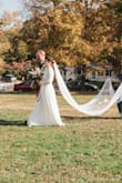 I wore this for my small October, outdoor wedding and it was a beautiful choice! Definitely had to be altered for me because I'm short, and the sleeves were also a bit too long and wide for me! Overall, I loved this dress! I came back to buy my second dress for my reception this June here as well! I always recommend lulus! - Victoria G.