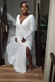 When my dress arrived I thought it was absolutely stunning, however something was missing. I removed the bell sleeves and just made a fitted long sleeve. I fell in love even more. My husband loved how it shaped me. I felt glamorous and romantic in my wedding dress. - Yamilee F.