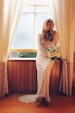 I used this beautiful dress for a photo shoot with a local historical society to promote their ballroom for weddings . My model looked stunning and she said the dress was very comfortable. Love the lace look! It's light weight so still suitable for a spring wedding. Love this dress. - Christine P.
