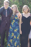 Wore this for prom, had to hem it but it looked very good, had a lot of positive comments. Coverage can be a bit small on the sides for bigger chest sizes & skirt runs a bit large around the waist, but the ties in the back make it easier to deal with this! Overall very pleased - Madeline C.