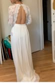 Tried it in a Small and an XS, small is the size in pics.. Back was killer both times. Didn't like how it hugged my torso tho. 
Small: sleeves fit too loosely.
XS: ribs fit too small to get arms to fit nicer. - Anna G.
