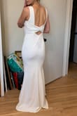 Really pretty dress. Loved the back and lines are crispy and clean. It fit like a G-L-O-V-E and was still comfortable to breathe, but like you could see every line of my body. Almost would size up to not be stressed about that. Sleek and pretty. I wanted to go with something more interesting since the front is so simple, but this is a dress that can feel modest and sexy at the same time. - Anna G.