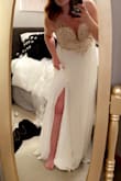 Lovely details. Very comfortable. I ordered an 8 but I couldn't get it zipped up all the way, I had to return for a 10. I have a wider rib cage and there's no stretch in the material. Hopefully the 10 works because I loved the dress other than that. - Alisha D.