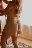 Love these shorts!! I was deciding between the medium and large and the large worked out great! They're a good length and loose but not baggy. I wore them in a cozy, at-home couples photo session and they looked great and I wear them all the time around the house. (also got the matching top) - Ivy P.