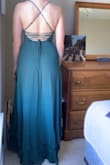I absolutely love the style of this dress and the color. Bought it for a wedding. Fits true to size. Didn't have to hem it wearing 4 inch heels. - Michelle M.