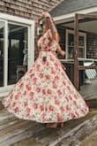 This dress is well made with quality fabric and so feminine! Light weight and lined. It flows beautifully, but the wind won't pick it up easily. It's a little on the larger side but that's ok because my chest needs it. Fabulous job Lulus! - Nadia T.