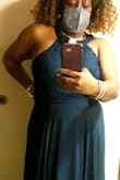 The dress has a unique style and a very easy flow.   I have a big tummy and yet the dress fit beautifully.  I particularly love the cut of the bodice and the intricate details of the top of the dress.  I wore this to a wedding in Texas. - Alexia H.